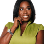 Smiling woman in green dress with watch.