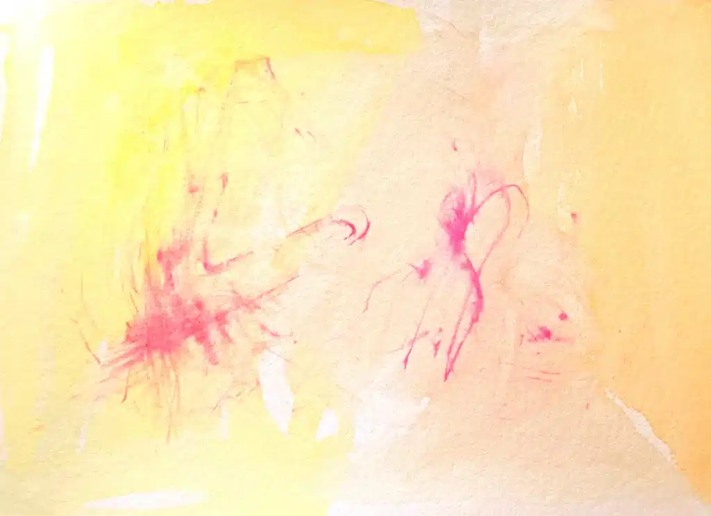 Abstract watercolor with yellow and pink splashes