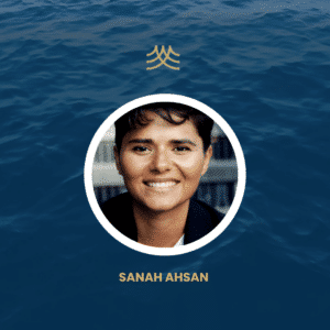 Smiling person on blue water background