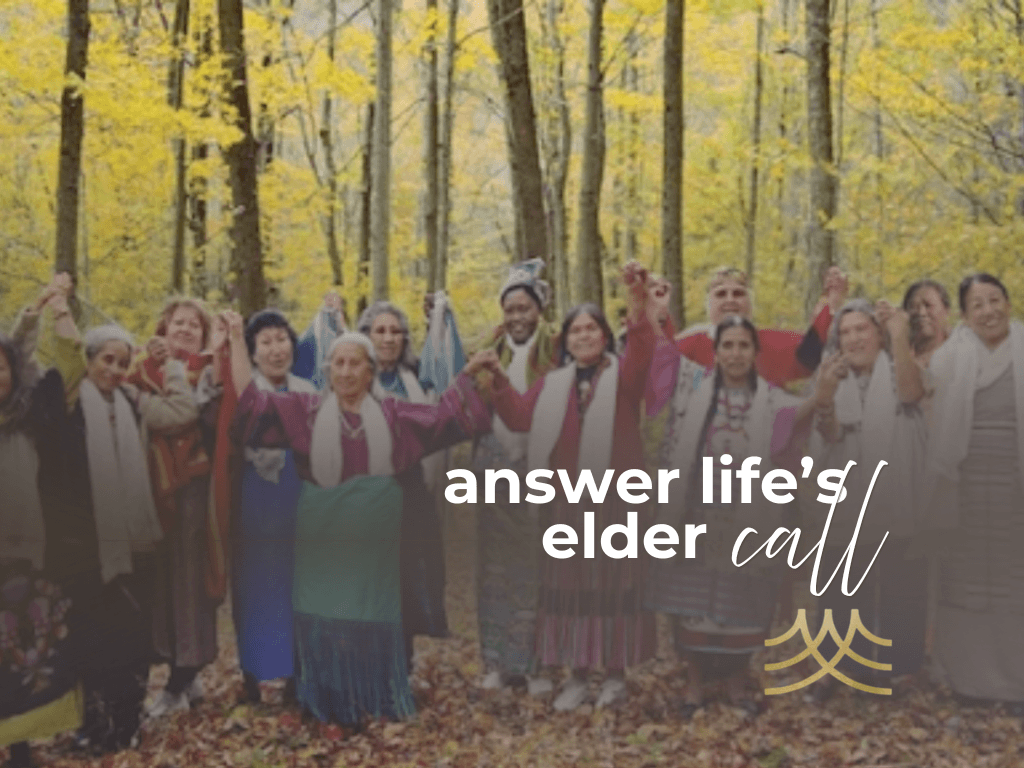 Elder women holding hands in autumn forest