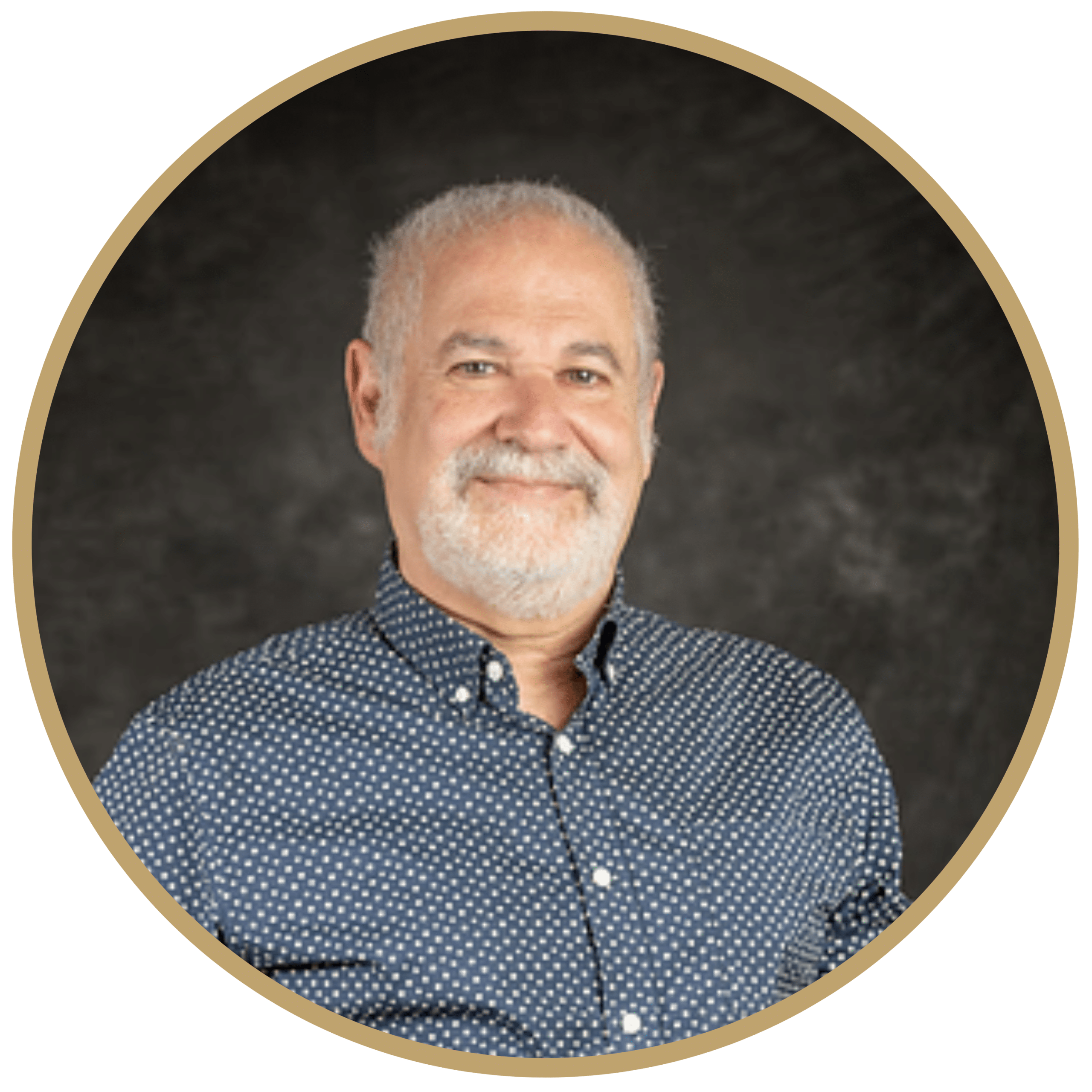 Smiling older man in patterned button-down shirt