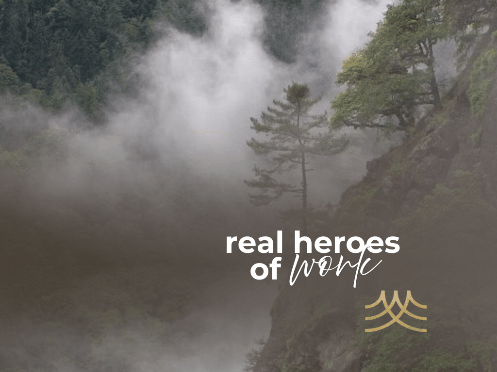 Misty mountain forest with inspirational text overlay