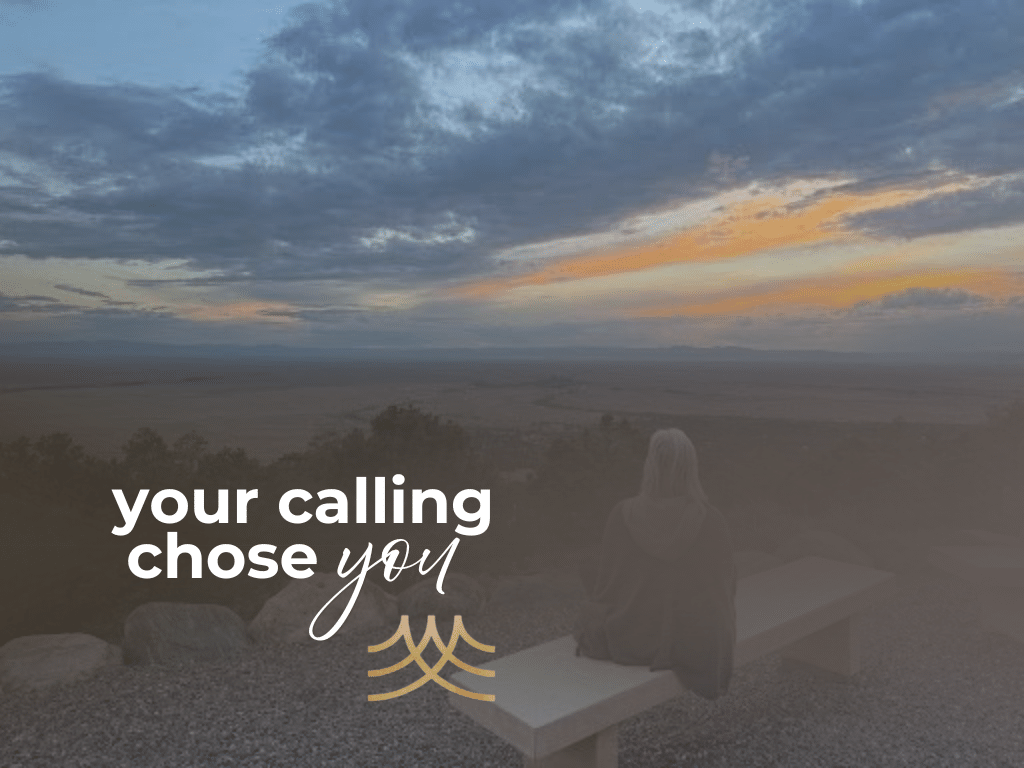Person on bench overlooking sunset landscape
