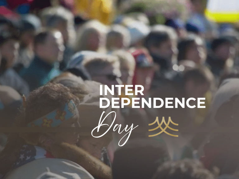 Crowd celebrating Interdependence Day at outdoor gathering